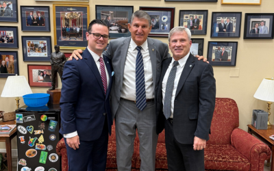 Portrait of BMH Chief External Affairs Oficer Ray Harrell, Senator Joe Manchin, and BMH President & CEO Virgil Underwood