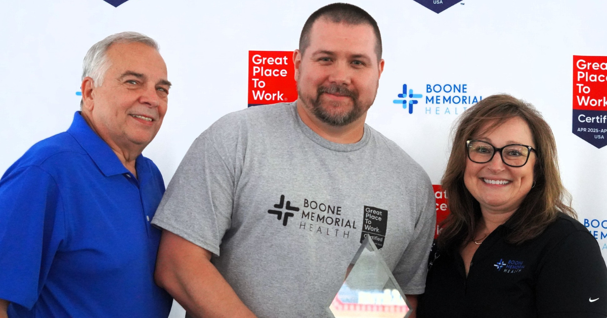 Physical Therapist Nick Shreve receives BMH's 2025 Robert L. “Bob” Brown Outstanding Service Award. Nick is pictured with Bob Brown and BMH COO Angela Christian.