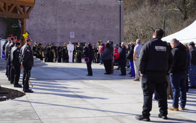 Scott High School Band and guests gather at Market on Main for the 2025 Veterans Day Memorial and Flag Raising Ceremony